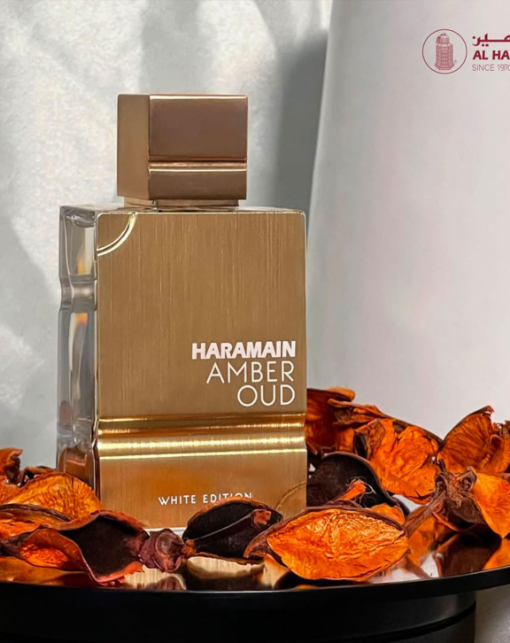 Al Haramain Amber Oud White Edition, Amber Oud White Edition, Eau de Parfum, Oriental Woody Amber, luxury perfume, oud fragrance, amber perfume, woody fragrance, unisex perfume, bergamot perfume, raspberry fragrance, jasmine perfume, rose perfume, sandalwood perfume, vanilla musk, long-lasting perfume, premium fragrance, Arabic perfume, designer perfume, niche fragrance, elegant perfume, luxury scent, SKU OUD-BAI
